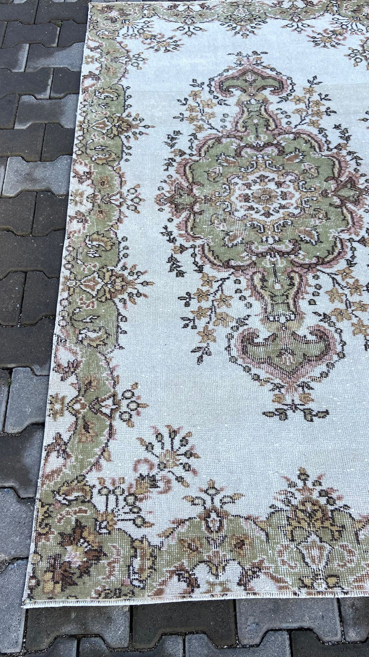 Light green and beige vintage floral handmade carpet