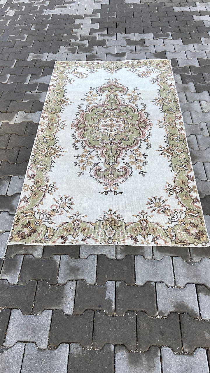 Light green and beige vintage floral handmade carpet