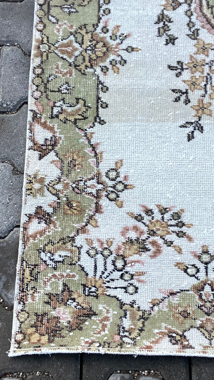 Light green and beige vintage floral handmade carpet