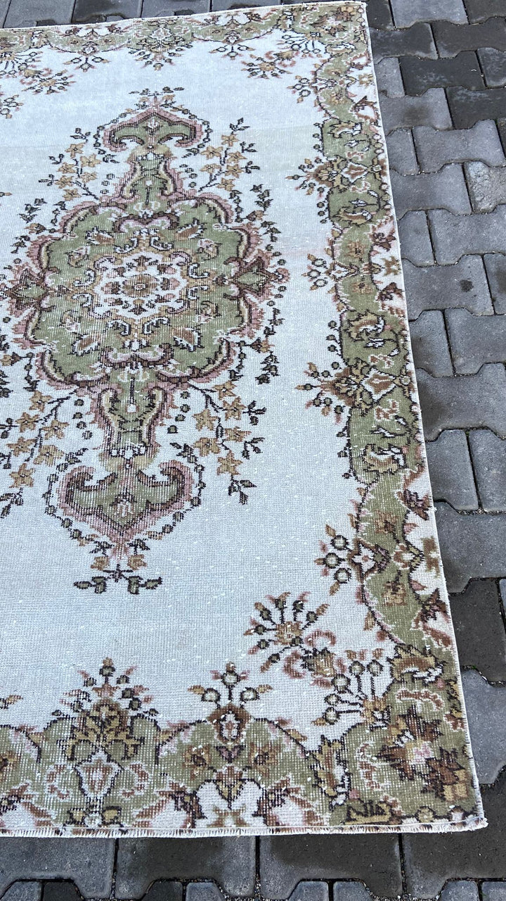 Light green and beige vintage floral handmade carpet