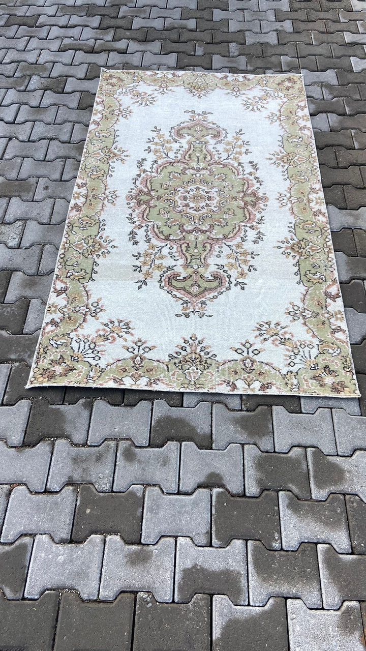 Light green and beige vintage floral handmade carpet
